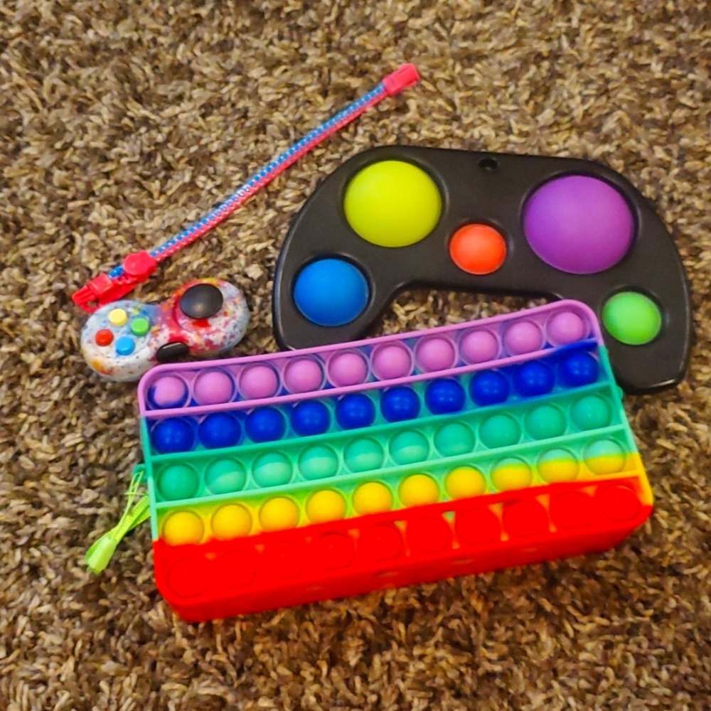 Dimpl, pop it purse, fidget pad, zipper bracelet